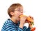 Boy eating large sandwich