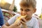 Boy eating Megrelian Khachapuri