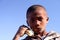 Boy eating sugar cane