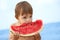 Boy eating watermelon