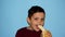The boy eats a banana