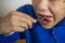 boy eats vegetable salad with a fork, mouth