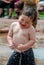 Boy enjoys a summer fountain