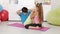 Boy exercising at home doing abdominal strengthening routine