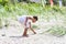 Boy exploring beach