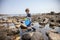 Boy exploring tide pools on New Hampshire coast