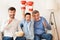 Boy, Father And Grandfather Watching Boxing Match On TV Indoor