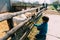 Boy feeding goats