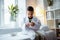 Boy feeling curious playing with model of brain in father office