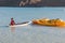 Boy floating on a paddle board at Balandra Beach