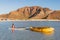 Boy floating on a paddle board at Balandra Beach