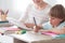 Boy focusing on homework