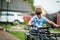 Boy in four-wheller ATV quad bike