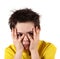 Boy with frightened look in white background