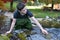 Boy in garden pond