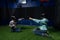 boy and girl in casual clothes combat fighting game using virtual reality headset in gaming club