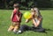 Boy and girl cheats varicolored air-ball