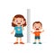 Boy and girl measure height and compare grow progress