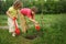 Boy and girl plant tree