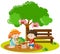 Boy and girl planting tree in garden