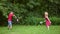 Boy and girl playing badminton