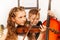 Boy and girl playing musical instruments together