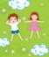 Boy and girl relax on a green meadow