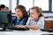 Boy And Girl Using Desktop Pc In School Computer