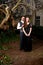 Boy and girl in Victorian clothing in the park