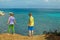 Boy and girl watching the sea