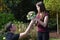 Boy gives flowers to his girlfriend