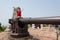 Boy on a gun in the old Russian fort