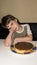 Boy and handmade cake, pie person