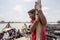 A boy hanging and smiling Karnafuli river boats tarminal.