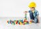 Kids Play Room, Child in Hard Hat Playing Building Blocks Toys