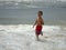 A boy is having fun on bigest and most beautiful beach of Gold Coast Australia