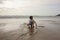 boy having a good time in a Cantabrian beach