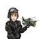 Boy in the helmet of the pilot, in the hands of a toy helicopter