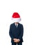Boy hiding his face with a Santa hat