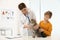 Boy with his cat visiting veterinarian