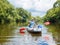 Boy with his father kayaking