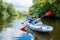 Boy with his father kayaking