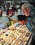 A Boy and His Grandfather Shop at the Tucson Gem and Mineral Show