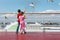 Boy and his sister feed seaguls