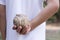 Boy holding a baseball ready to pitch