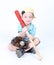 Boy holding a bat with ball and glove