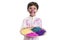 Boy holding color plate