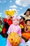 Boy holding Halloween pumpkin with his friends