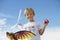 Boy Holding Kite At Wind Farm