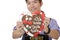 Boy holding Oktoberfest heart and smiles